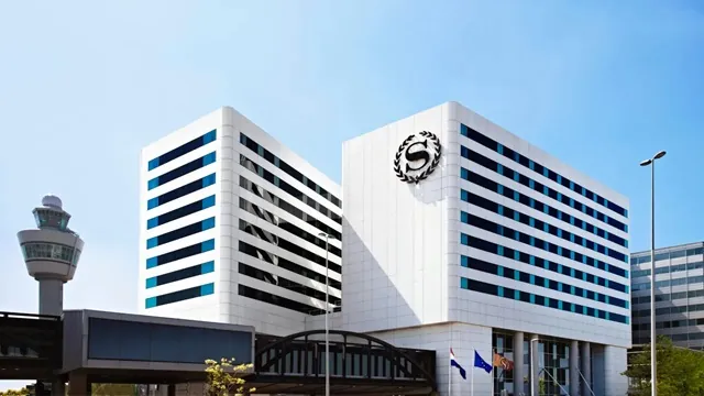 Airport terminal beside a modern hotel