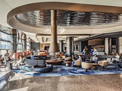 Spacious modern airport lounge with work and relaxation areas